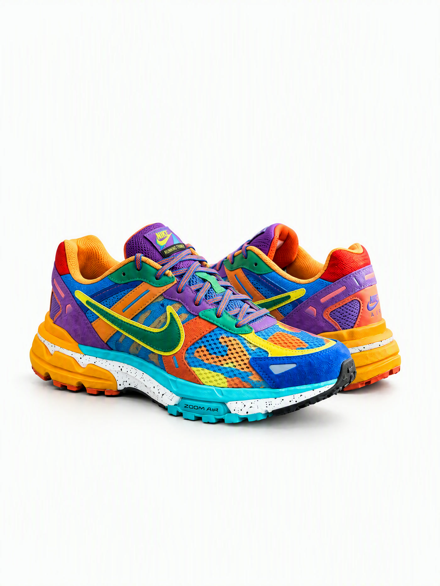 Pair of multicoloured running sneakers photographed on a white background